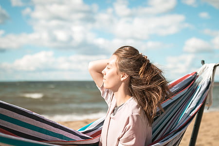 woman beside to hammock with stand thumbnail