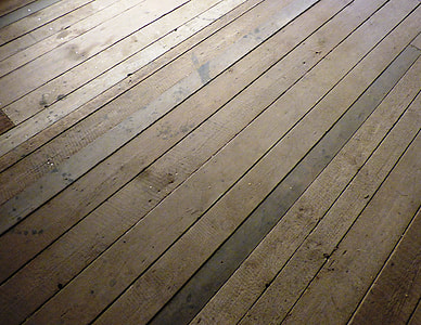 close up photo of brown wooden floor panels thumbnail