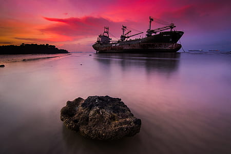ship docking in middle of water thumbnail