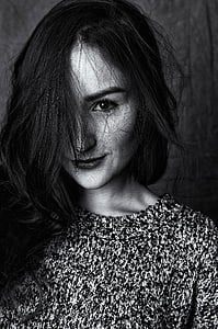 grayscale photo of woman wearing gray crew-neck top thumbnail