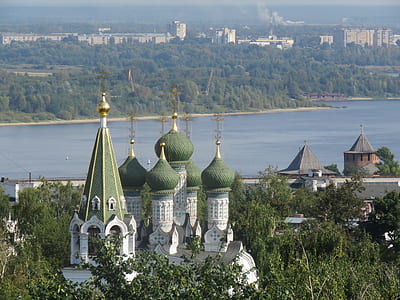 white and green castle near river during daytime thumbnail