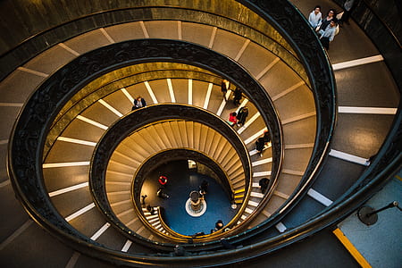 hi-angle photo of spiral stairs thumbnail