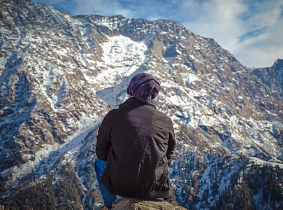 Person Sitting on Hill thumbnail