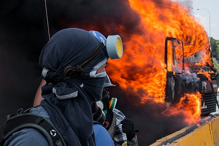 man near burning truck thumbnail