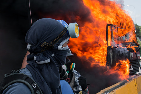 person wearing black respirator mask thumbnail