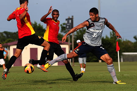 men's playing soccer thumbnail