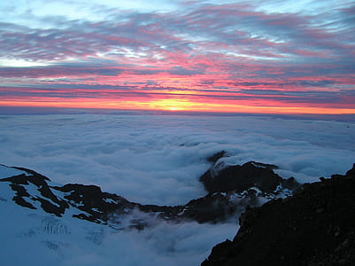 aerial photography of sea of clouds during sunset thumbnail