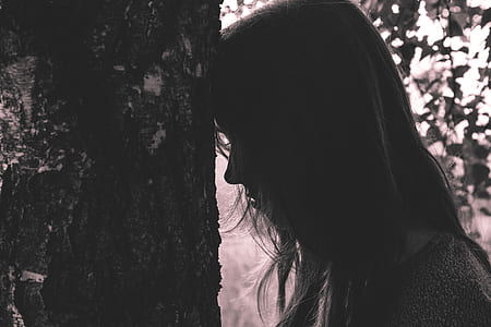 grayscale photography of woman wearing gray top thumbnail