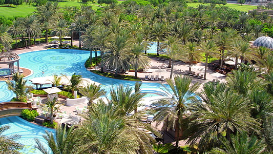 aerial photo of concrete swimming pool during daytime thumbnail