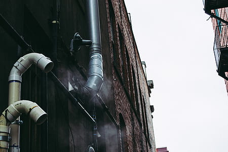 Gray Pipe on Building Wall thumbnail