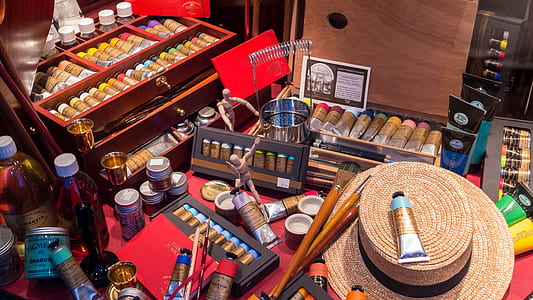 brown hat near painting tools thumbnail