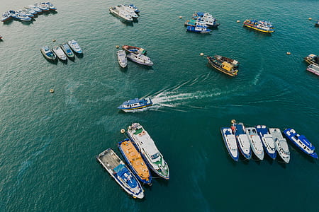 motorboats on body of water during daytime thumbnail