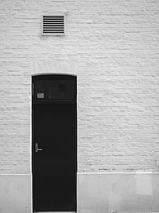 white air vent over black wooden door thumbnail