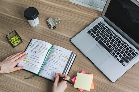 Writing In Notebook Photo thumbnail