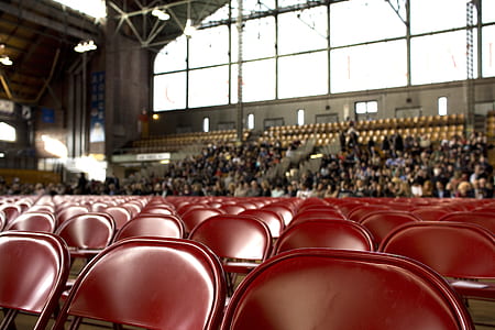 red chairs inside building thumbnail