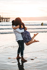 man and woman hugging each other during daytime thumbnail