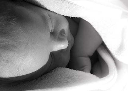 baby sleeping with white blanket thumbnail