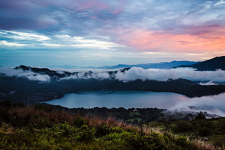 Bird's Eye Photo Of Mountain And Body Of Water thumbnail