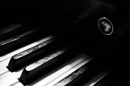 piano keys in closed-up grayscale photo thumbnail