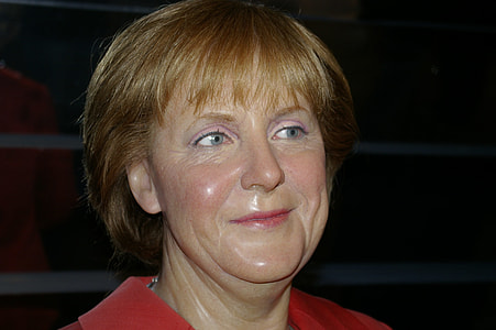 smiling woman wearing pink top thumbnail
