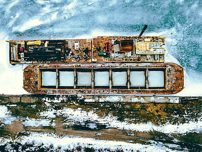 aerial photo of brown building at winter season thumbnail