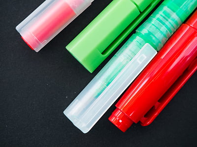 four green and red pens thumbnail