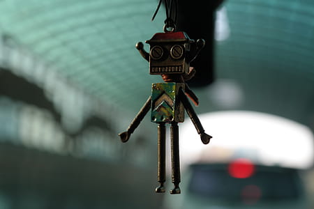 brown and green robot hanging decor thumbnail