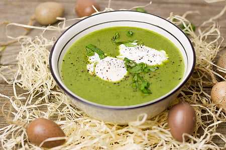 green soup in a white bowl thumbnail