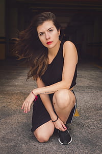 woman kneeling on floor thumbnail