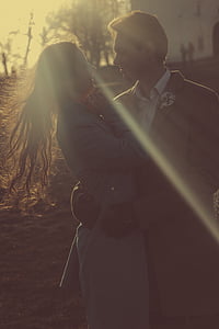woman and man embracing white looking each other thumbnail