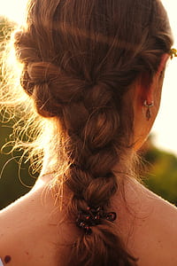 woman showing fishtail braid hair thumbnail