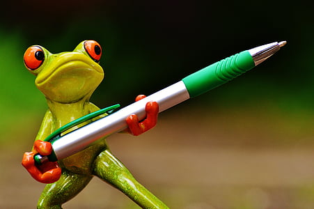 red eyed tree frog holding silver and green click pen thumbnail