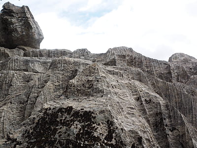 low angle photography of rock mountan thumbnail