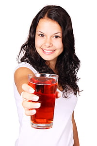 woman holding clear drinking glass thumbnail