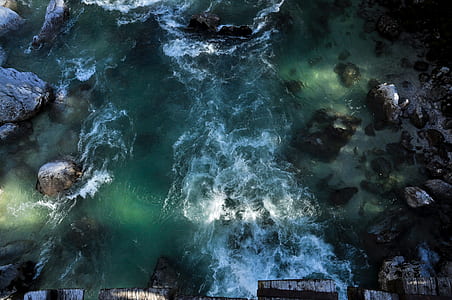 high angle photography of body of water thumbnail