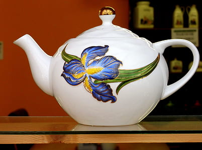 white, green, and blue floral-printed teapot thumbnail