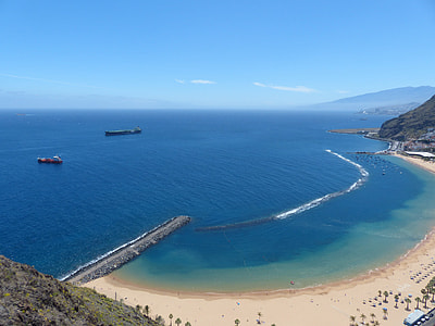aerial photo of seashore and large body of water thumbnail