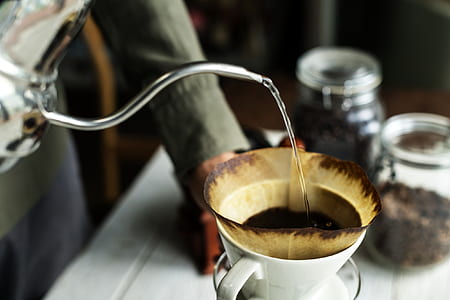 water pouring on coffee filter cup thumbnail