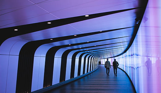 people walking in hallway thumbnail
