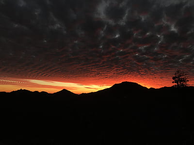 silhouette of mountain during sunset thumbnail