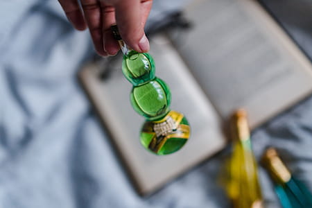 Group of colorful little bottles with liqueurs thumbnail