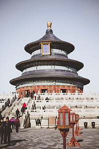 people walking on street near temple thumbnail