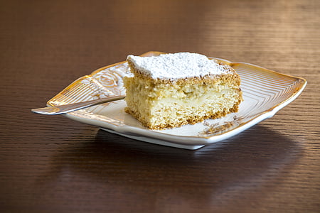 slice of cake on white ceramic plate thumbnail
