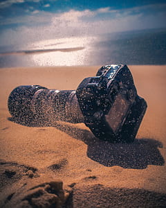 black DSLR camera thumbnail