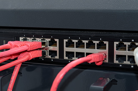 red USB cable wire plugged in black electronic appliance thumbnail