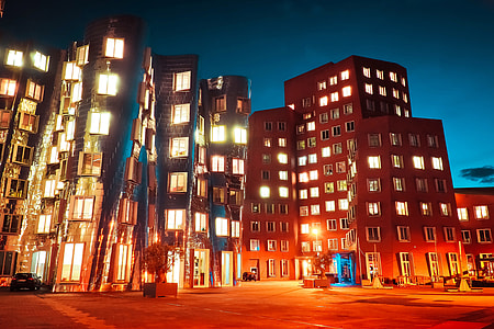 City buildings and windows captured at night thumbnail