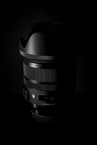 close up photo of black DSLR camera lens thumbnail