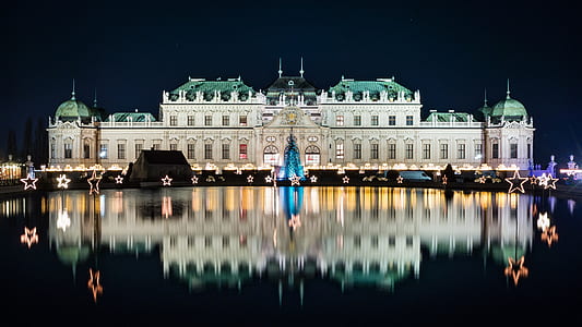 panoramic photo of white building at night time thumbnail