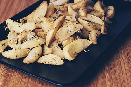 cooked food served on black tray thumbnail