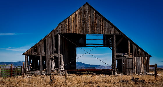 brown barn under blue sky thumbnail
